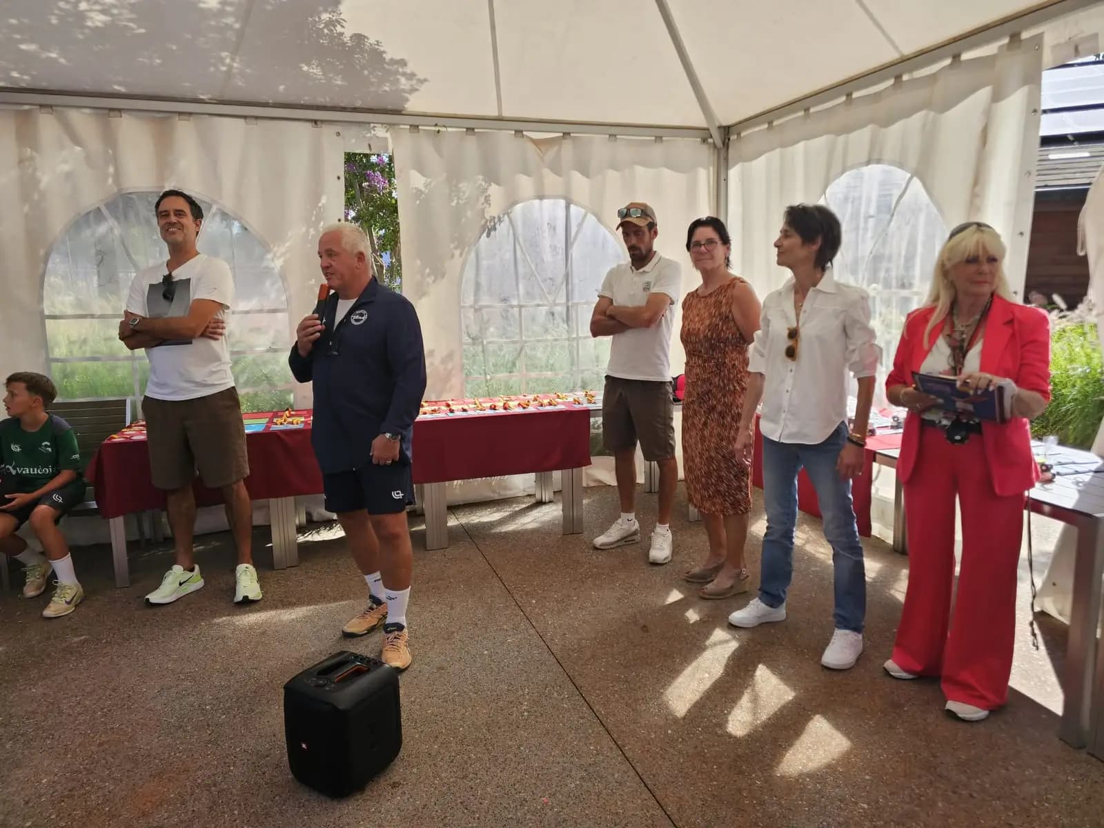 Speeches and prize-giving under the Geneva Championships marquee